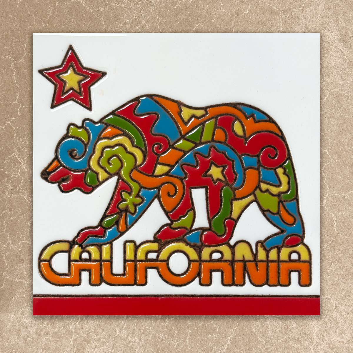 Colorful bear design with 'California' text on a beige background