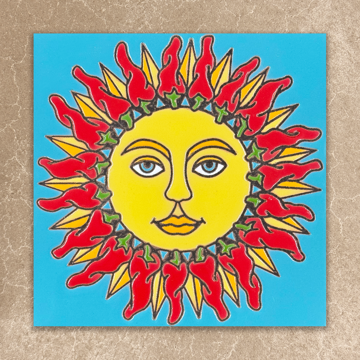 Colorful sun with face design on a blue background