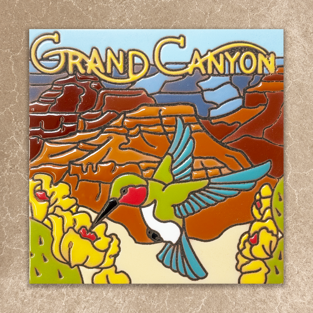 Colorful illustration of a hummingbird and flowers with 'Grand Canyon' text on a textured background