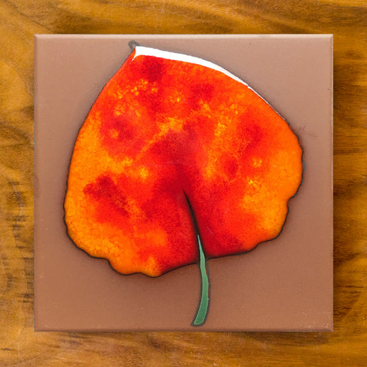 aspen leaf ceramic tile orange on terra cotta