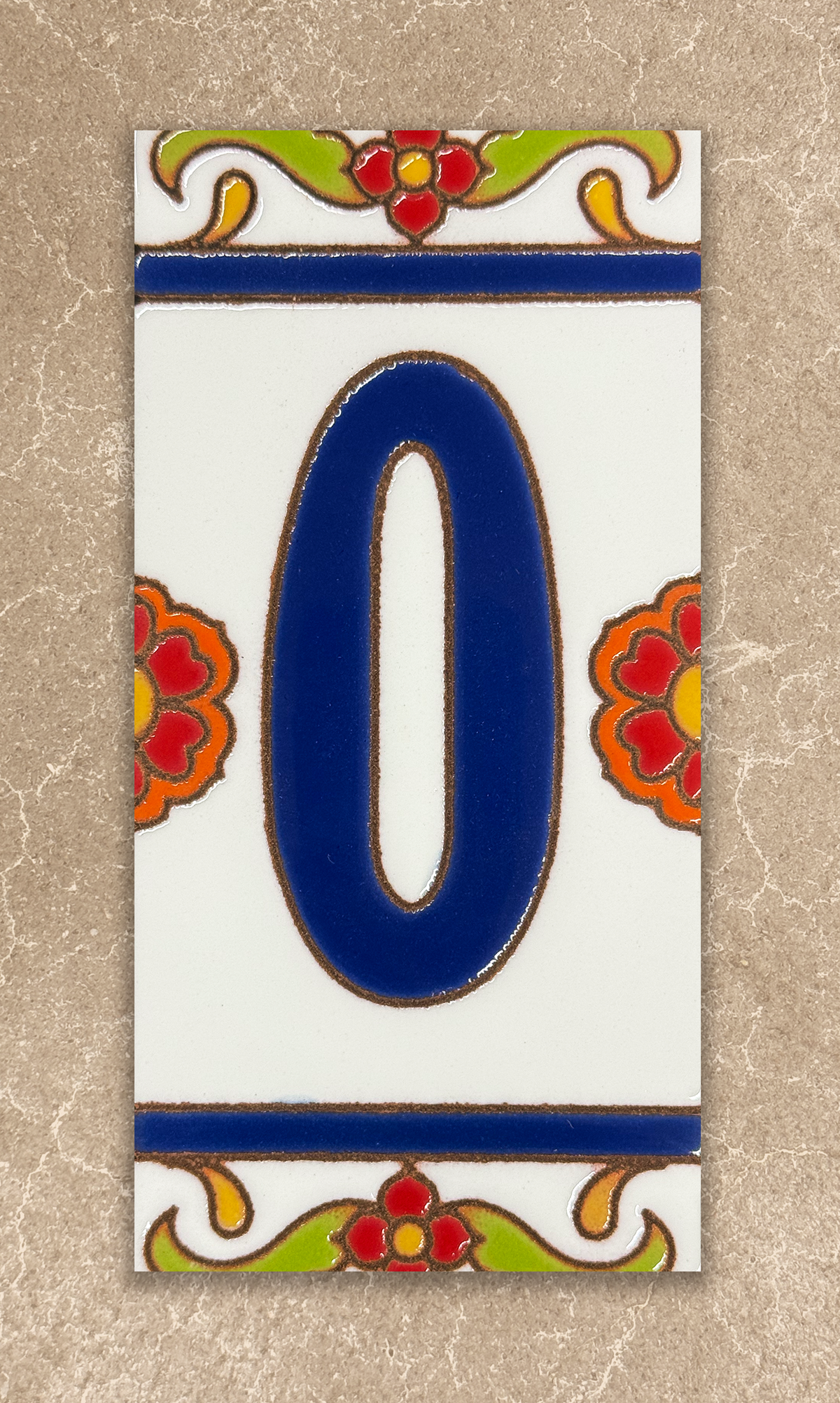 Decorative number '0' tile with floral designs on a beige background