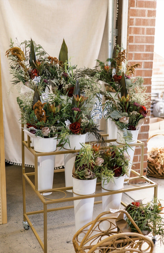 7/23 5:30pm: Glaze your own 6” Cow skull with red flowers tile and create a floral bouquet with Bunnytail Blooms by Bun Bun Vending