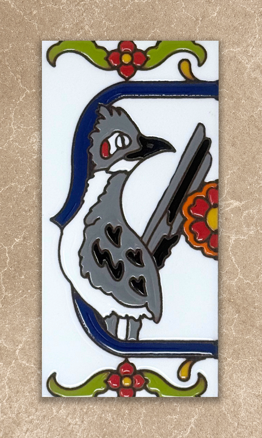 roadrunner talavera end cap house number tile on beige background