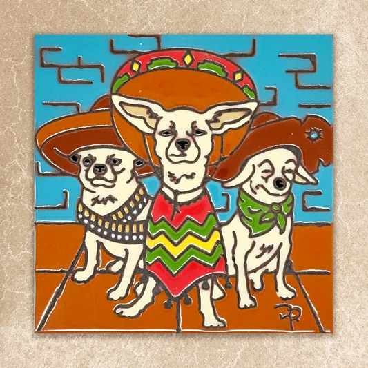 Decorative tile with a colorful illustration of three dogs wearing hats and traditional clothing on a blue and brown background.