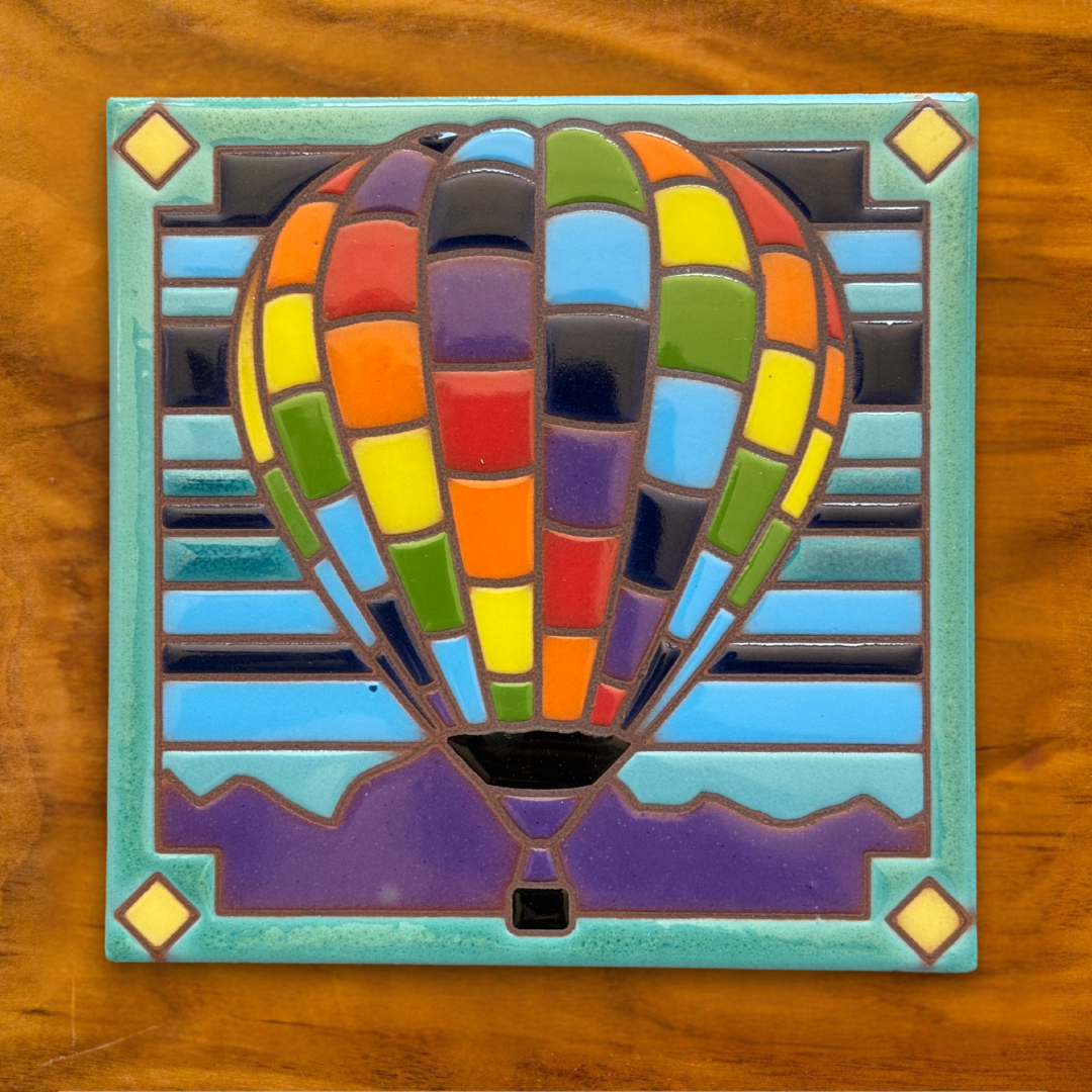  vibrant 6”x6” Patchwork Hot Air Balloon ceramic tile design, inspired by the iconic Albuquerque International Balloon Fiesta and the colorful skies of New Mexico. 