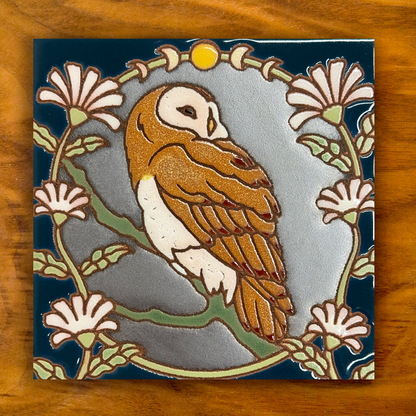 barn owl and white flowers ceramic tile on a wooden background
