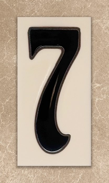 Black number '7' on a beige background