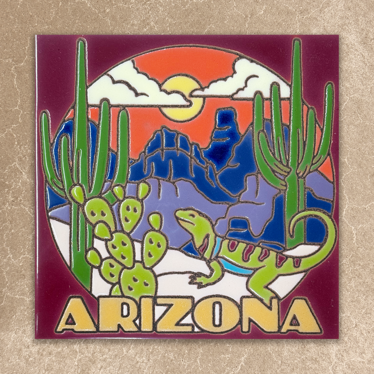 Pin with desert landscape featuring cacti and a lizard, with 'Arizona' text on a beige background
