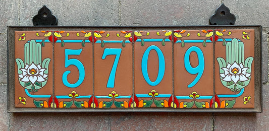 Framed House Number Set with Hamsa Hand End Caps, Terra Cotta Background, and Turquoise Numbers