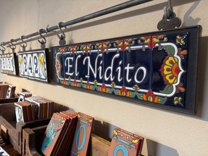 Custom House Sign with Talavera End Caps, Dark Blue Background, and White Letters