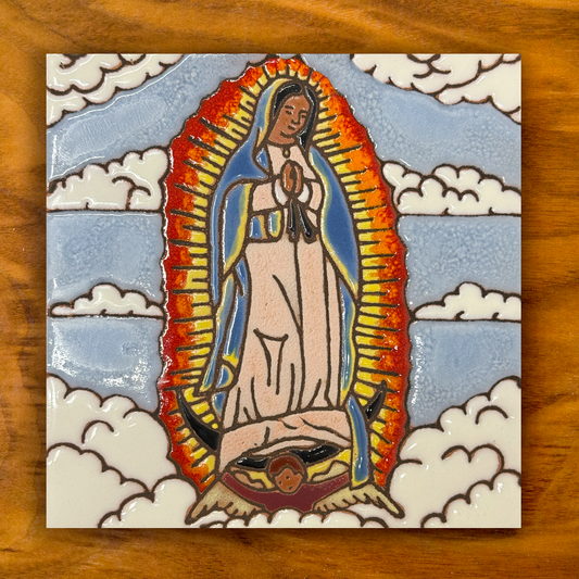 our lady of guadalupe colorful ceramic tile on a wooden background