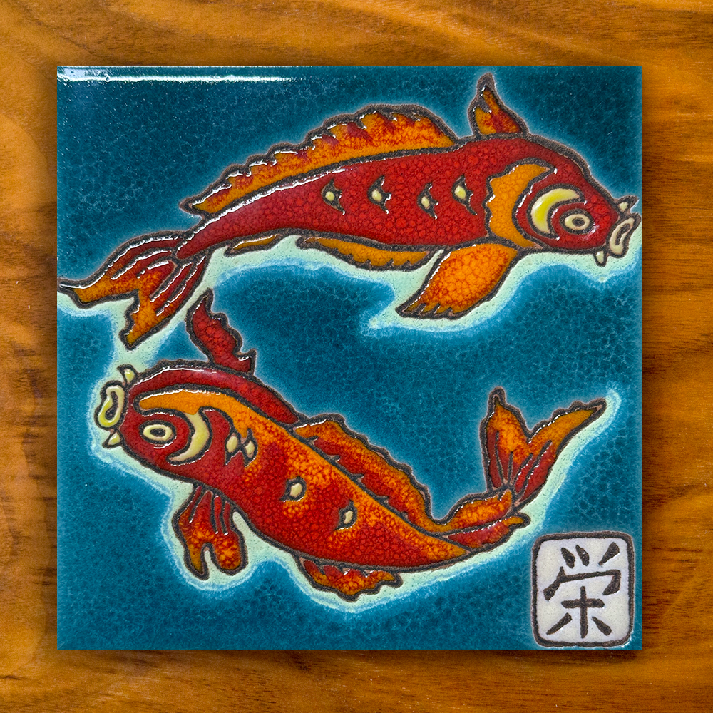 koi fish ceramic tile on a wooden background