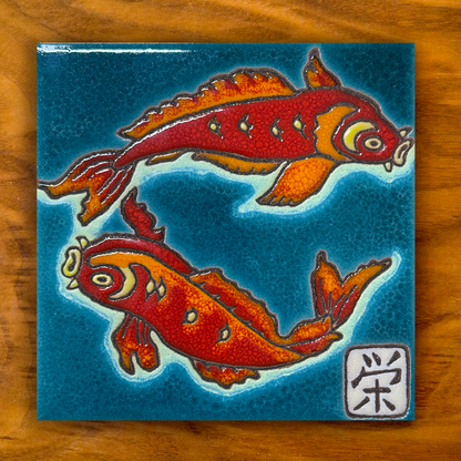 koi fish ceramic tile on a wooden background