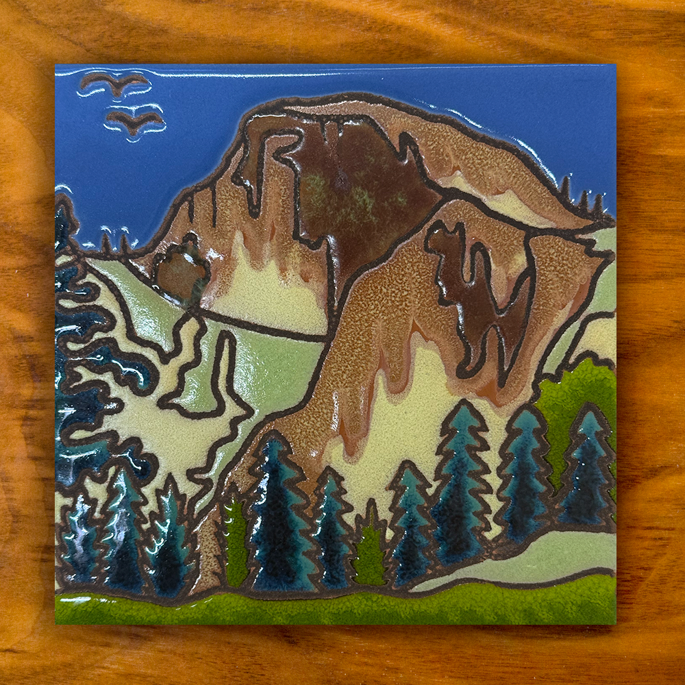 yosemite half dome ceramic tile on a wooden background