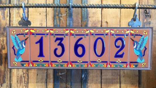 Framed House Number Set with Hummingbird End Caps, Terra Cotta Background, and Royal Blue Numbers