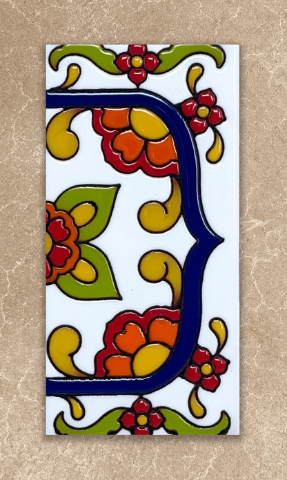 Decorative tile with colorful floral design on a beige background