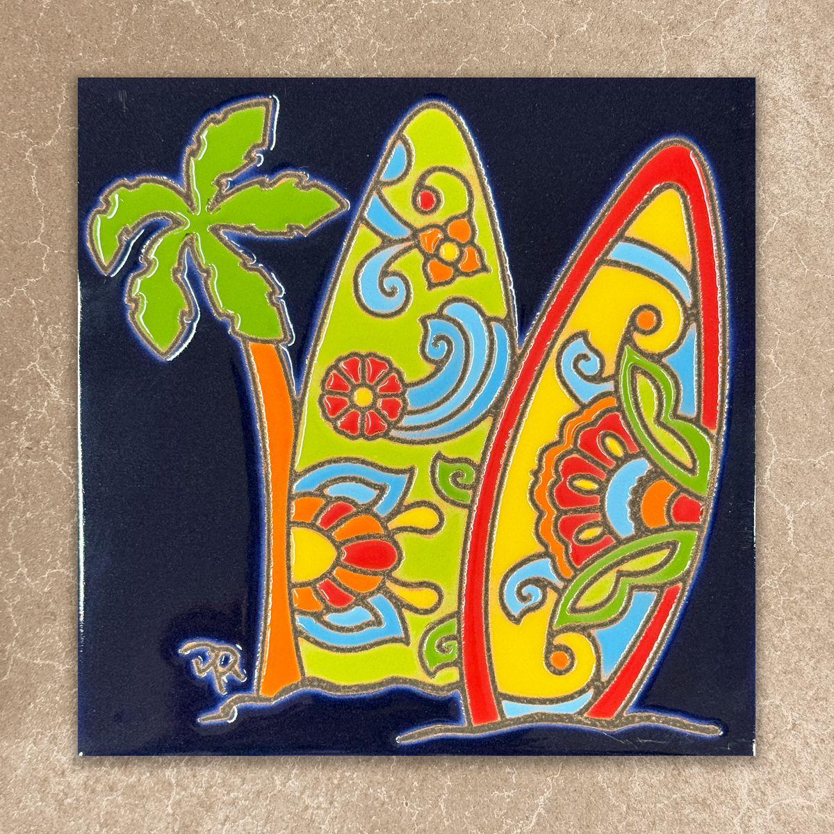 Colorful surfboard and palm tree design on a dark background