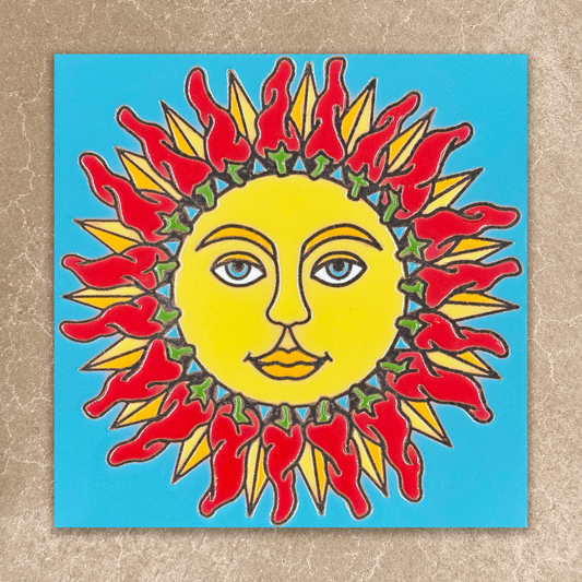 Colorful sun with face design on a blue background