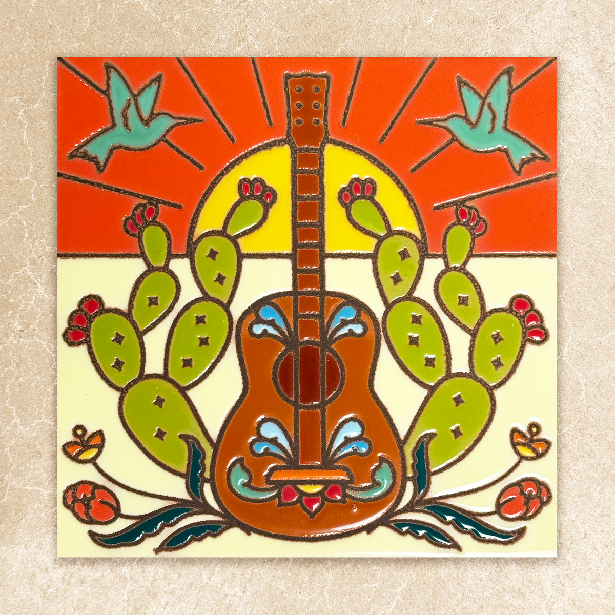 Decorative tile with a guitar, cacti, and birds on a beige background