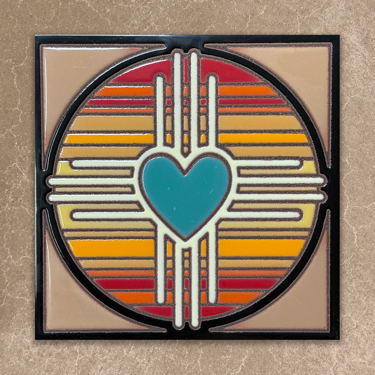 Decorative wall art with a heart design and colorful concentric circles on a beige background
