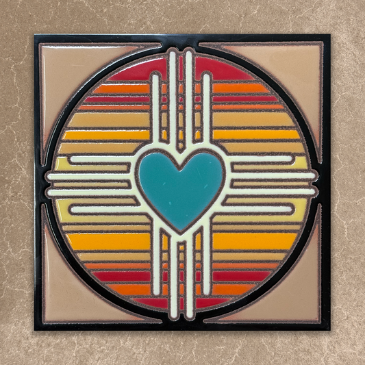 Decorative wall art with a heart design and colorful concentric circles on a beige background