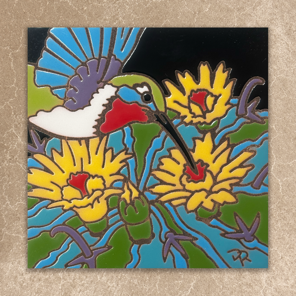 Colorful ceramic tile of flowers and hummingbird on a textured surface