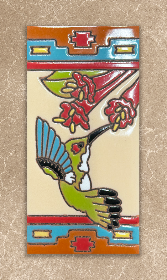 Decorative tile with a hummingbird and floral design on a beige background