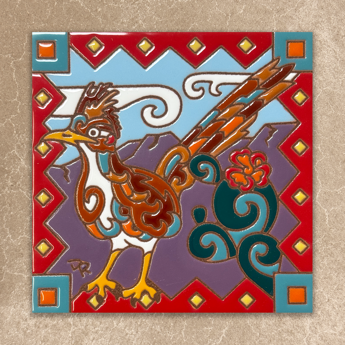 Decorative tile with a stylized rooster design on a beige background