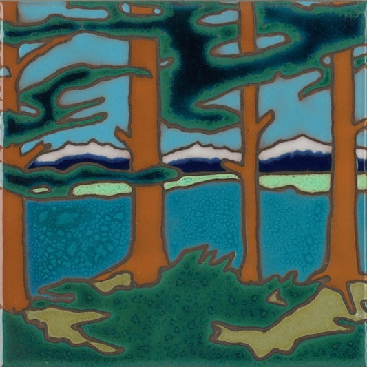 A square ceramic tile featuring a stylized landscape painting of pine trees, a blue lake, distant mountains, and a green foreground, with a glossy glaze.