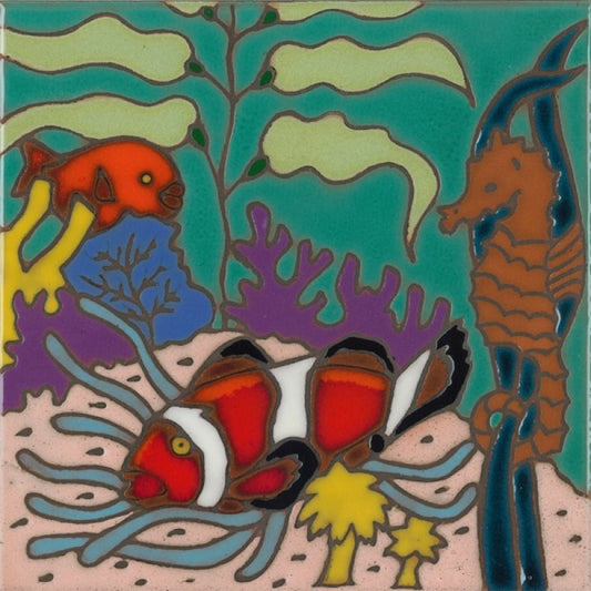 A square ceramic tile featuring a colorful underwater scene with clownfish, a seahorse, a red fish, coral, and sea plants on a teal background.