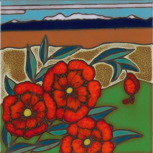 A square decorative tile or print featuring stylized red flowers with teal leaves on a green ground, with tan textured hills and a blue mountain range under a light blue sky.